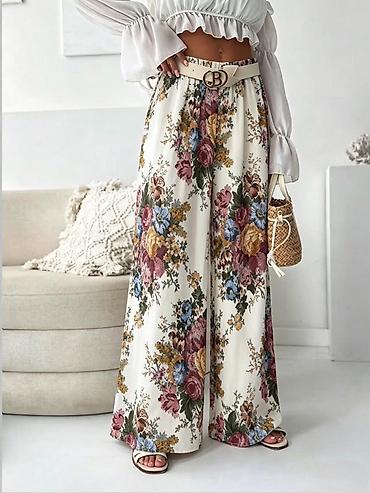sandale platforme: Ženske široke palazzo pantalone sa floralnim printom
1900
Din
S M L — 1