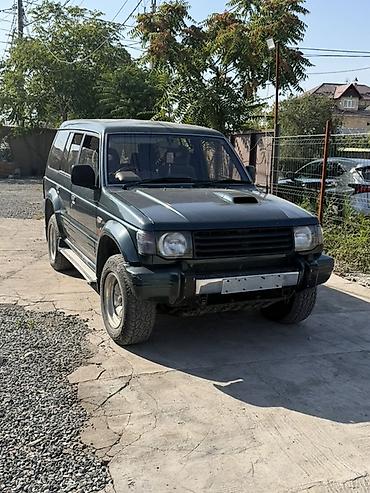 чехлы мех: Mitsubishi Pajero: 1994 г., Автомат, Внедорожник — 1