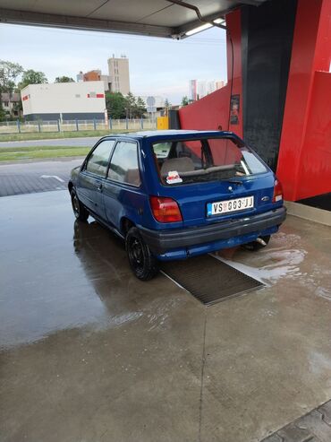 Transport: Ford Fiesta: 1.8 l | 1990 year | 50000 km. Coupe/Sports