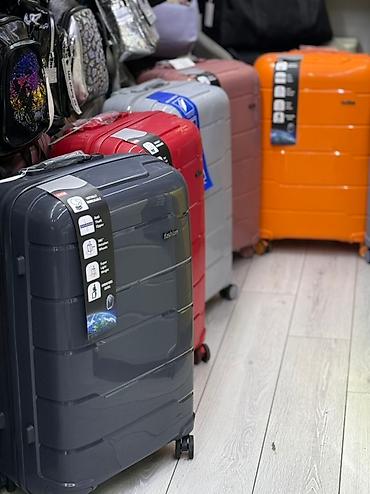 Чемоданы: Чемодан, Новый, Большой (более 70 л), Вращающиеся колеса на 360°, Кодовый замок, На колесах — 4