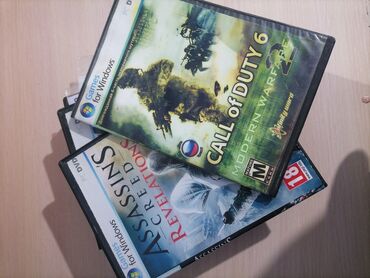 sumka riva: Диски Call of Duty Modern Warfare -250 Assassins creed revelations