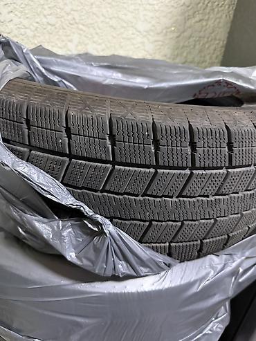 моно 1 6: Зимняя шина Toyo 215/60 R16 95T. На боковине видны: - размер: 215/60 — 2