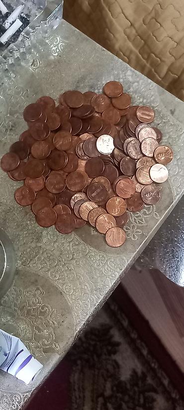 Sikkələr: 150 ədəd ABŞ 1 senti - ABŞ-da, əmək haqqının yüksək olması və kard — 3