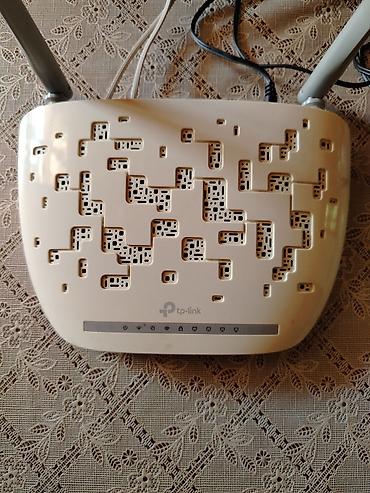 TP-Link Wi‑Fi router Xüsusiyyətlər: - İki ədəd xarici antenna –