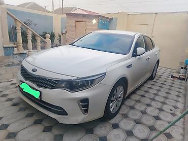 Kia: Kia K5 sedan – ağ rəng, 4 qapı, ön çəkiş. Geniş və komfortlu salonlu — 1