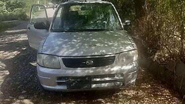 Daihatsu: Daihatsu Cuore: 2002 г., 1 л, Механика, Бензин, Хэтчбэк — 2