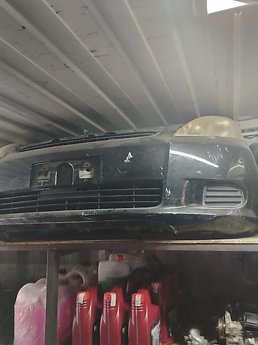 Передний бампер в сборе для Mitsubishi (эмблема на бампере). Цвет —