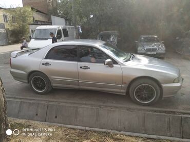 радиатор кондиционера опель зафира а: Седан Mitsubishi Galant в серебристом цвете с четырьмя дверями и