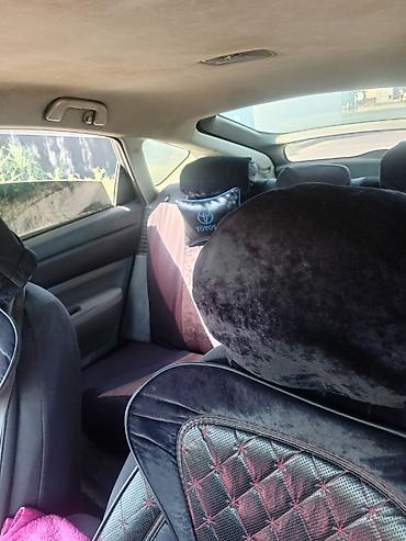 nolyeddi şəkilləri: Toyota Prius (2-ci nəsil) hibrid hetçbek - Rəng: qara - Kuzov: 5 — 6