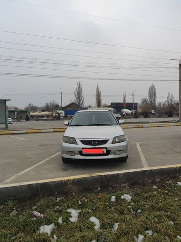 Mazda: Mazda 323: 2002 г., 1.5 л, Механика, Бензин, Хэтчбэк — 2