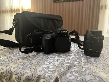 canon çanta: Canon 4000D aparatı.20 şekıl cekılıb.kart ve çantası var.1 ıldır