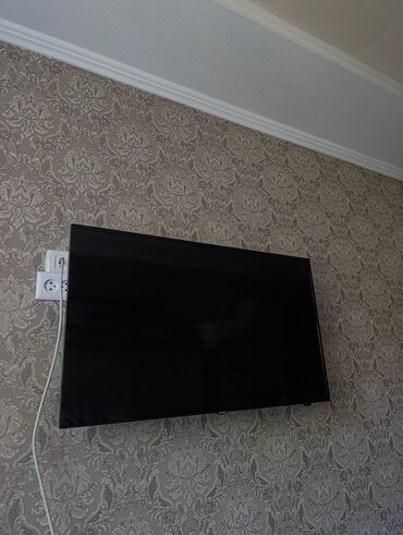 телевизоры б у lcd: Плоский телевизор с черной рамкой, предназначенный для настенного