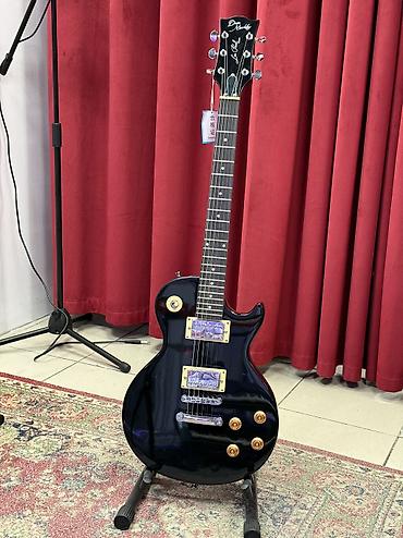 Электрогитара типа Les Paul, черный глянец. - Корпус: классическая