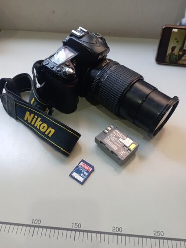 nikon d90: Salam.Nikon D90 fotoaparati obyektiv 18-105mm+.uzerinde 8 gb yaddas