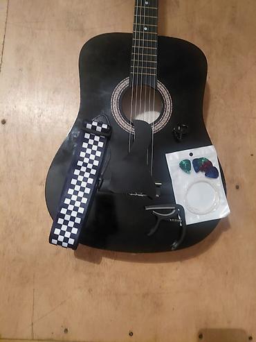 gibson gitara: Qara rəngli klassik akustik gitara seti Məlumatlar aşağıda qeyd — 3