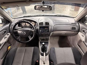 Mazda: Mazda 323: 2003 г., 1.6 л, Механика, Бензин, Универсал — 9