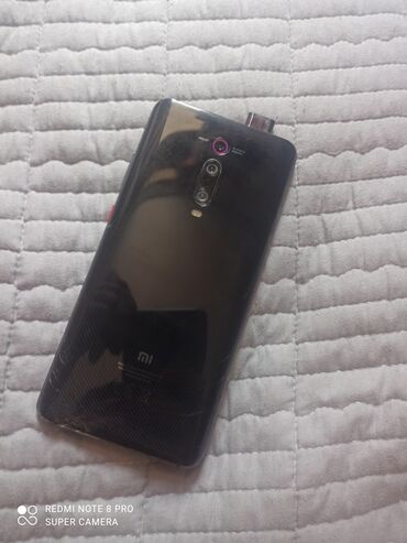 машинка строчка: Xiaomi, Mi 9T Pro, Б/у, 128 ГБ, цвет - Черный, 2 SIM