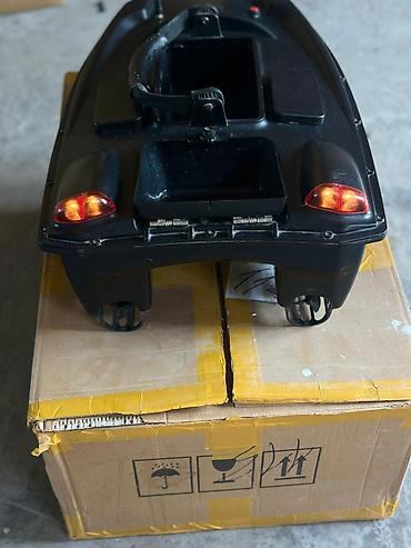 Прикормочные кораблики и кормушки: Кораблик‑прикормочник с дистанционным управлением и GPS Описание: - — 2