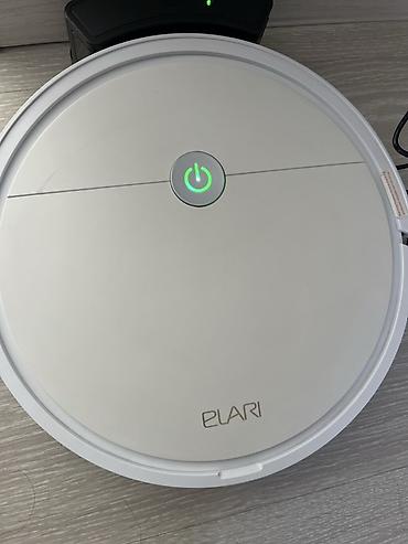 roboclean 114f: Робот-пылесос ELARI в белом корпусе. Компактная круглая модель для — 1