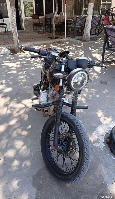 Мотоциклы: Kafe-reyser üslubunda yığılmış yol motosikleti - Çərçivə: boru tipli — 1