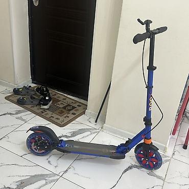 Velosipedlər: Kecen il alinib.30 man satilir.Bezi problemleri var.Amma isleyir — 1