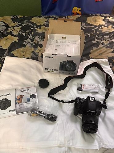 Фотоаппараты: Зеркальная камера Canon EOS 600D (Kit) Комплектация по фото: - Тушка — 1