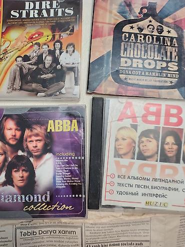 Musiqi CD/DVD diskləri toplusu Janr və ifaçılar: - Rock və pop: Dire