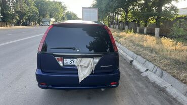 Honda: Honda Stream синего цвета, компактный минивэн, подходит для семейных