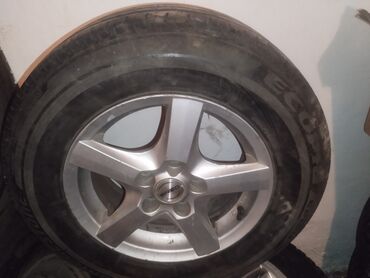 калпак размер 14: Шины 205 / 70 / R 15, Лето, Б/у, 1 шт, Легковые, Польша, Bridgestone