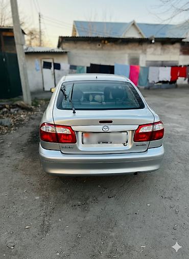 Mazda: Mazda Capella: 2000 г., 1.8 л, Механика, Бензин, Хэтчбэк — 3