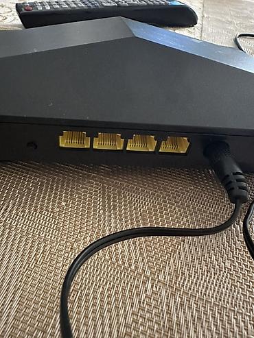 Modemlər və şəbəkə avadanlıqları: Wi‑Fi marşrutizatoru – 4 antenalı, qara korpus Xüsusiyyətlər: - 4 — 2