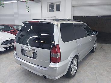 mitsubishi lancer evolution: Mitsubishi Chariot Grandis – 7 yerlik geniş ailə miniveni — 3