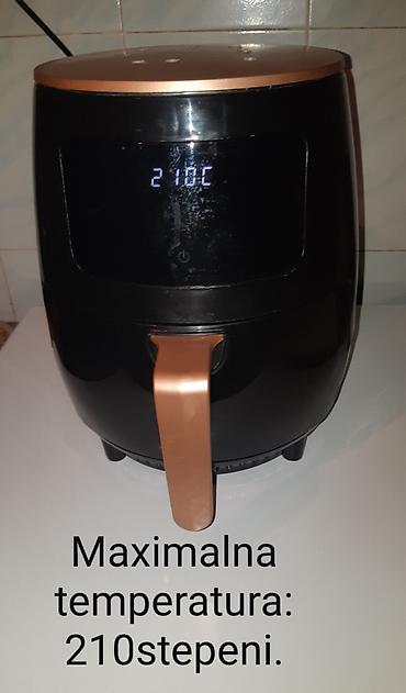 Ostali kuhinjski aparati: Friteza na vruć vazduh (air fryer) Model:SilverCrest S-18.Zapremina — 4