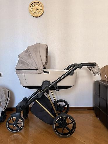 Modullu arabalar: Uşaq arabası 2‑də‑1 (körpə beşiyi + oturacaq bloku) Adamex markasıdır — 18