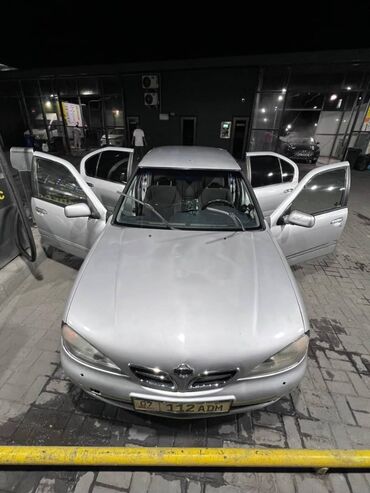 эко скутер: Серебристый седан Nissan Primera P11 – практичный и надежный