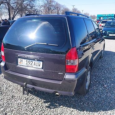 два авто: Mitsubishi Space Wagon: 1999 г., 2.4 л, Механика, Бензин, Минивэн — 6