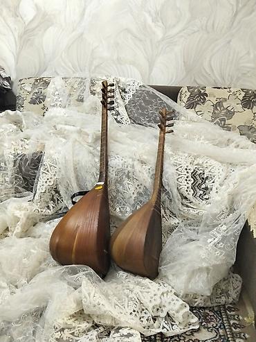 azerbaycan gitara mahnilari: Məhsul: 2 ədəd saz (aşıq sazı) Təsvir: - Uzun saplı, armud formalı — 1
