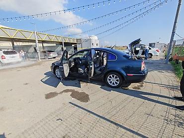 changan disk: Volkswagen Passat sedan. Avtomobil tünd göy rəngdədir və klassik — 7