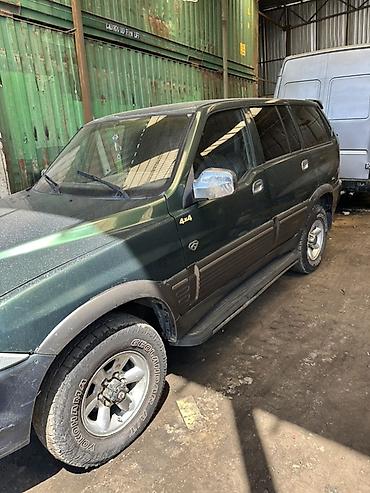 hongqi e: Ssangyong Musso: 2002 г., Механика, Дизель, Внедорожник — 3