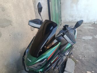 дождевик на скутер: Скутер JILANG год вупуска 2025(зеленый) с дополнительным оснащением