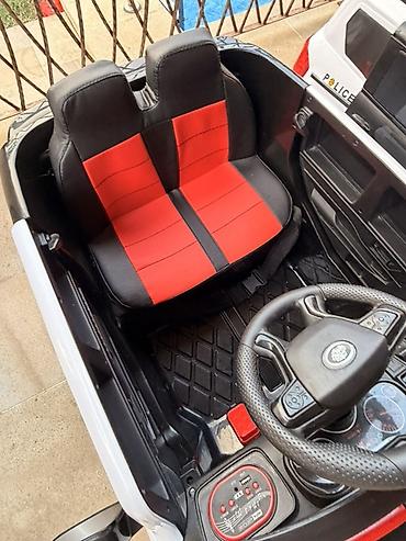 Uşaq dünyası: Uşaqlar üçün polis üslublu elektrikli mini avtomobil. Şəkillərdə — 3