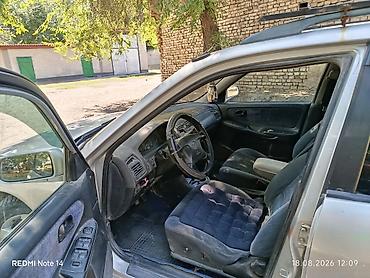 spark ltz: Mazda 626: 1999 г., 1.8 л, Механика, Бензин, Универсал — 4