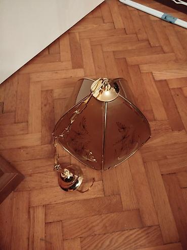 Rasveta: Zuckasti stakleni retro luster Donji kao precnik oko 34 cm. Visina — 4