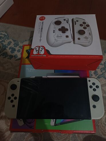 портативный игровой консоль: Nintendo Switch OLED Консоль в идеальном состоянии, покупал в начале