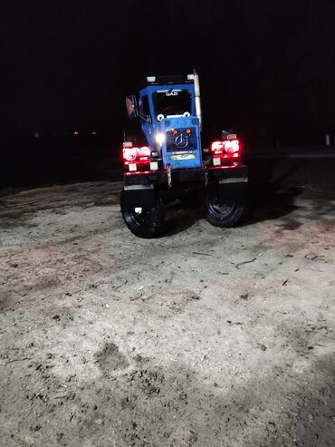 Traktorlar: Mavi rəngli ağır sinif təkərli traktor və qoşqu komplekti — 20