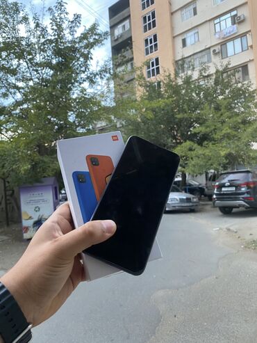 Xiaomi: Xiaomi Redmi 9C, 64 GB, rəng - Qara, 
 Barmaq izi, Face ID