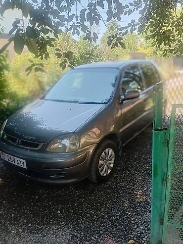 лога: Honda Logo: 2001 г., 1.3 л, Автомат, Бензин, Хэтчбэк — 4