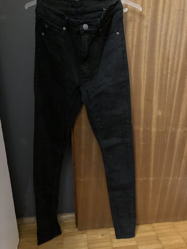 crne uske farmerke: Nove pantalone, XS veličina. Uske, uz telo,dubok struk. Pantalone