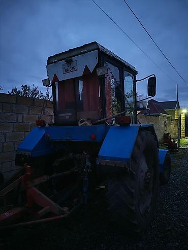 tap.az avtomobiller: Mavi rəngli kabinalı təkərli traktor - Ön kranklı, ikili dəyirmi — 6