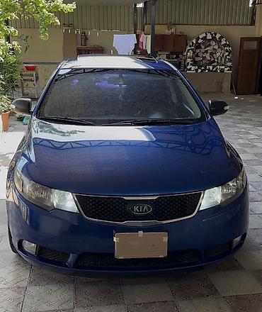 pajero stop: Kia Cerato: 2 l | 2009 il Sedan — 1